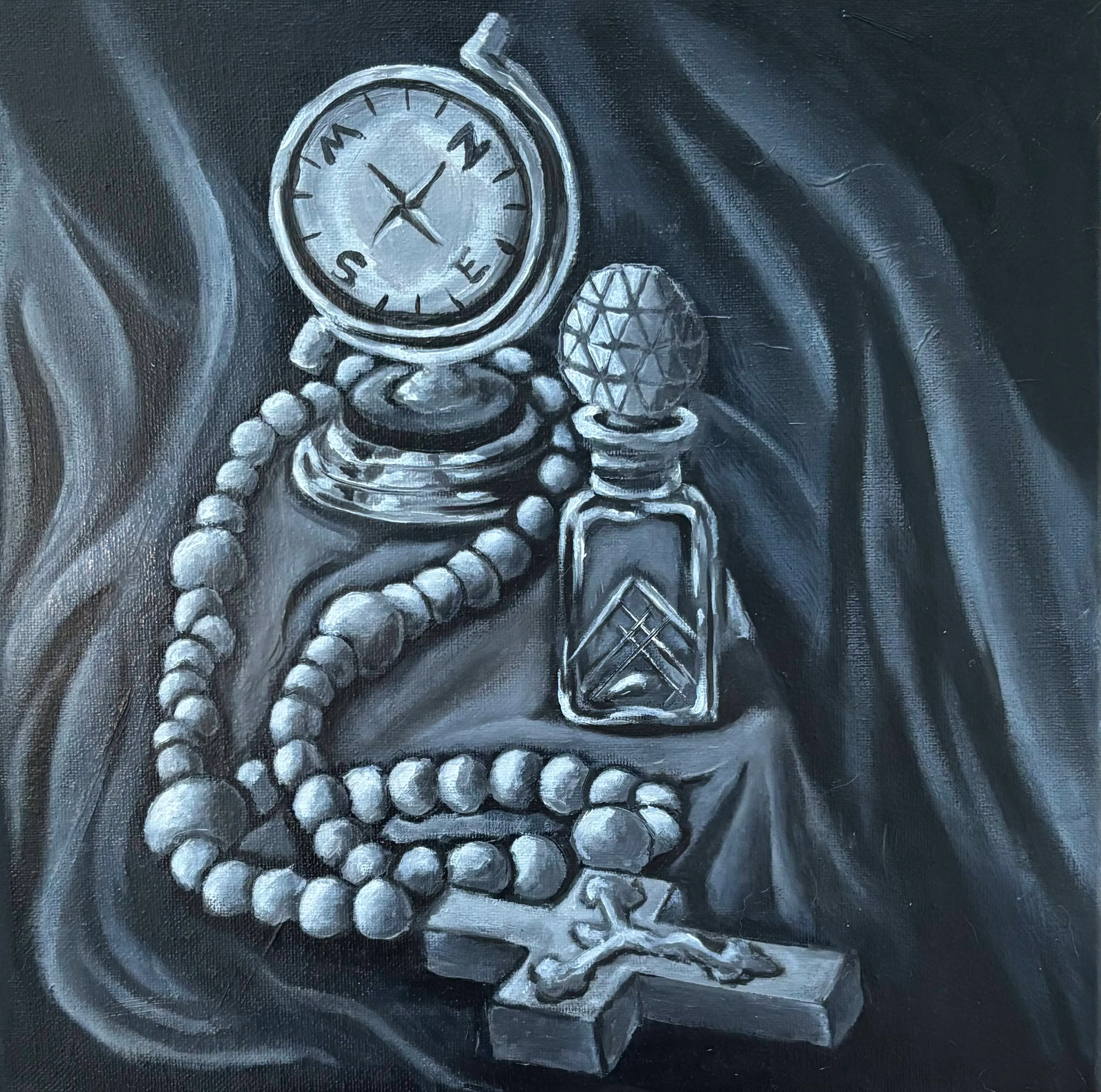 A black-and-white oil painting still life of a compass, a glass bottle, and a rosary with a cross.